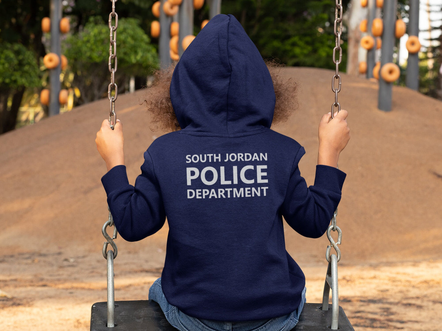 Back view of a navy blue hooded sweatshirt with the text 'SOUTH JORDAN POLICE DEPARTMENT' printed on the back.