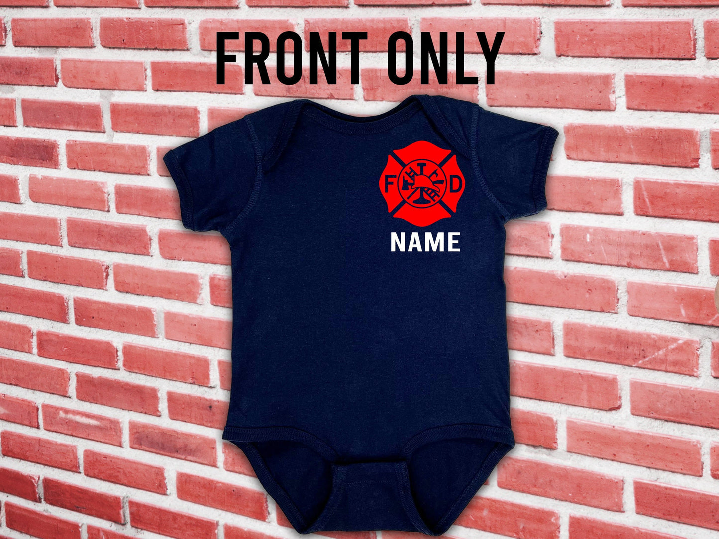 Front-only version of the navy blue baby bodysuit with red Maltese Cross emblem and custom name, displayed against a red brick background