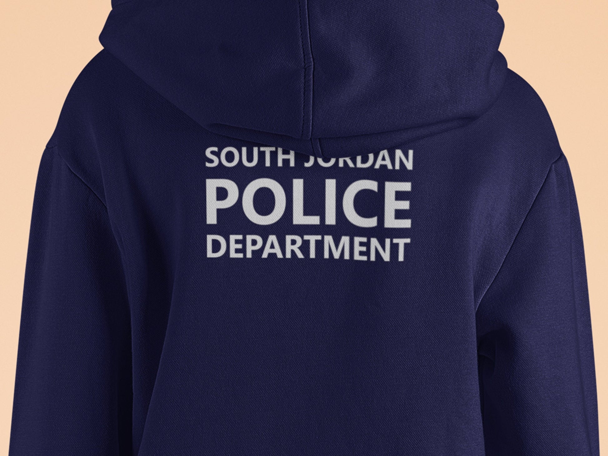 Child from the back wearing the hoodie, displaying the custom police department name 'South Jordan Police Department' in silver text