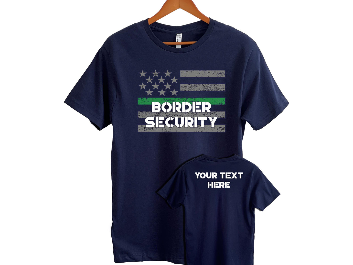 Navy blue t-shirt featuring a distressed American flag design with a thin green line and the bold text “BORDER SECURITY” on the front. A smaller image shows the back of the shirt with customizable placeholder text reading “YOUR TEXT HERE.” Perfect for honoring and supporting border enforcement.