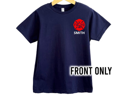 Front view of navy blue T-shirt with red Maltese cross on left chest with personalized name underneath in white.