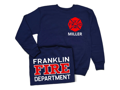 Navy blue crew neck sweatshirt with red Maltese cross on front left chest and the name 'Miller' underneath in white. Shirt back has 'Franklin Fire Department' in white and red text.