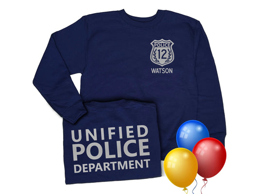 Navy blue youth sweatshirt with silver police badge on left chest including the number 12. The name 'WATSON' is printed underneath in silver text. The back of the sweatshirt has the words 'UNIFIED POLICE DEPARTMENT' printed in silver text.