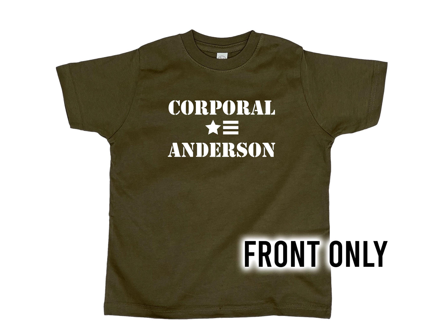 Army green t-shirt with 'Corporal' in white text on the top line, a star and 3 horizontal stripes underneath, and under that 'Anderson' in white text.