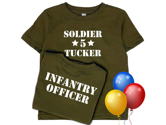 Army green short sleeve t-shirt with 'Soldier' in white text, 2 stars with the number 5, and under that the name 'Tucker'. The shirt back reads 'Infantry Officer' in white text. Three colorful balloons for a birthday theme.