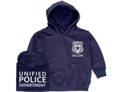 Navy blue hoodie with silver police badge on left chest and the name 'Watson' underneath in silver text. Back of hoodie has the words 'Unified Police Department in silver text.