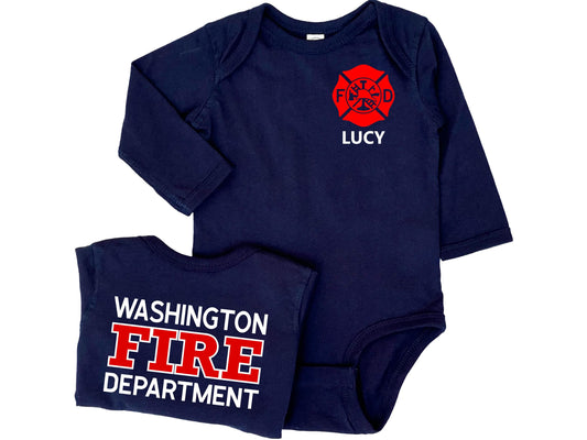 Navy blue long sleeve baby firefighter body suit with red Maltese Cross. Personalized name on front. Back of the bodysuit is personalized with fire department name and big red FIRE.