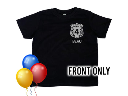 Front view of black short sleeve t-shirt with silver police shield on left chest. Shield has the number 4 and police with the name Beau underneath. 3 bright balloons for birthday theme.