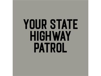 Closeup detail of shirt back text with 'Your state highway patrol' in three lines and black text on a gray background.