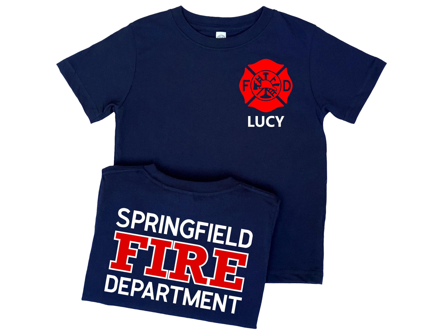 Navy blue t-shirt in children sizes with custom red Maltese Cross on the front. The child's name is under the Maltese Cross. The folded back of the shirt is shown with a custom fire department name with "Fire" and "Department" underneath.